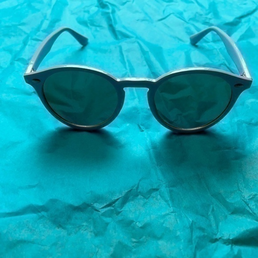 Bride sunglasses white frames Bride gold logo on each side black mirror lenses